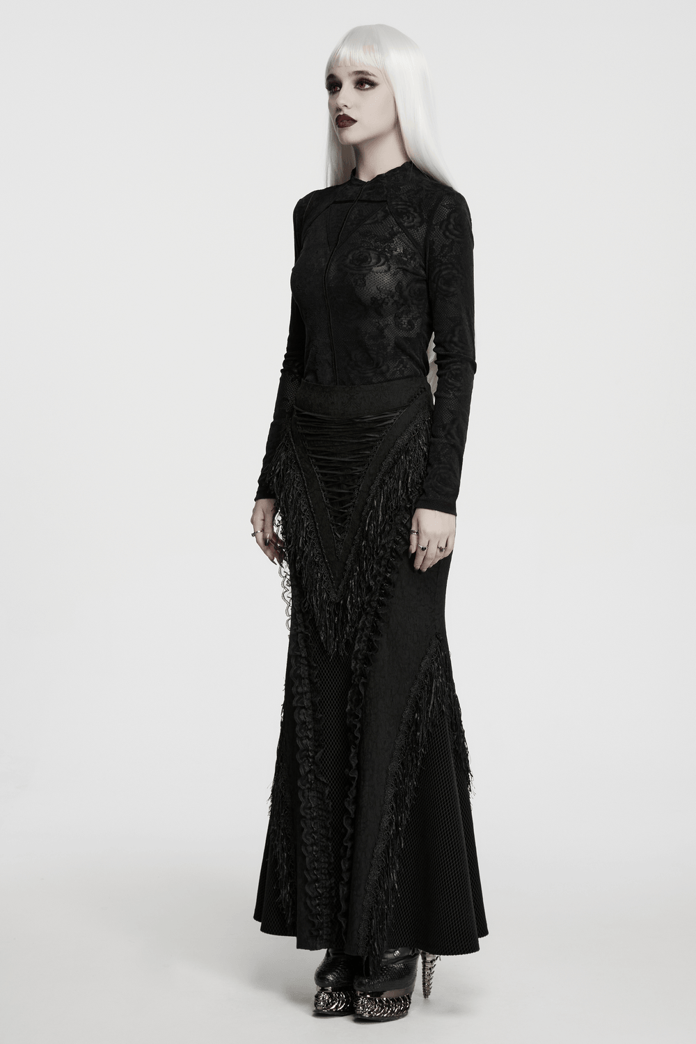 Women's Gothic Rose Lace Long-Sleeved Mesh Top worn with a stylish black skirt, exuding dark romance and elegance.