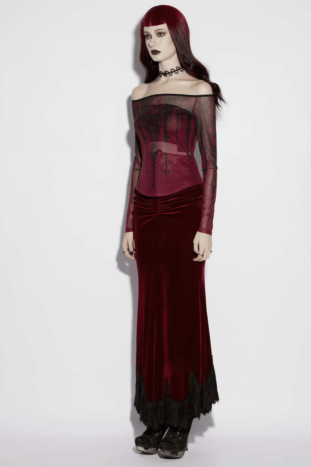 Women's Gothic Skull Print Off Shoulder Mesh Top styled with a dramatic skirt, perfect for layering in gothic fashion.