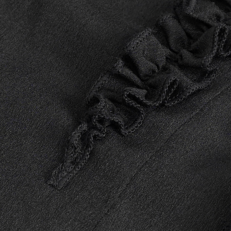 Close-up of intricate frill detailing on a women's gothic fitted shirt, showcasing its elegant design.