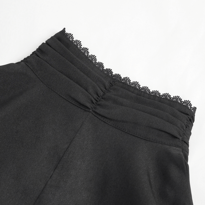 Close-up of the frill detailing on the stand collar of a women's gothic fitted shirt in black.