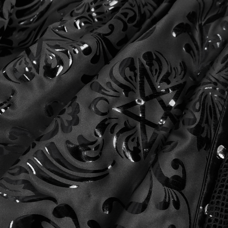 Close-up of intricate black fabric with gothic floral patterns and shiny details.