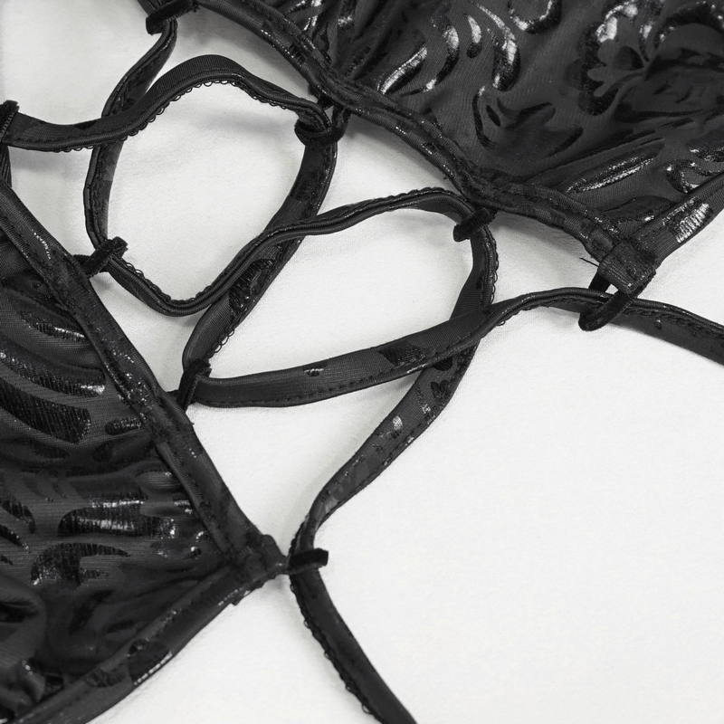 Close-up of lace-up details on a women's gothic floral swimsuit in black, showcasing stylish strappy design.
