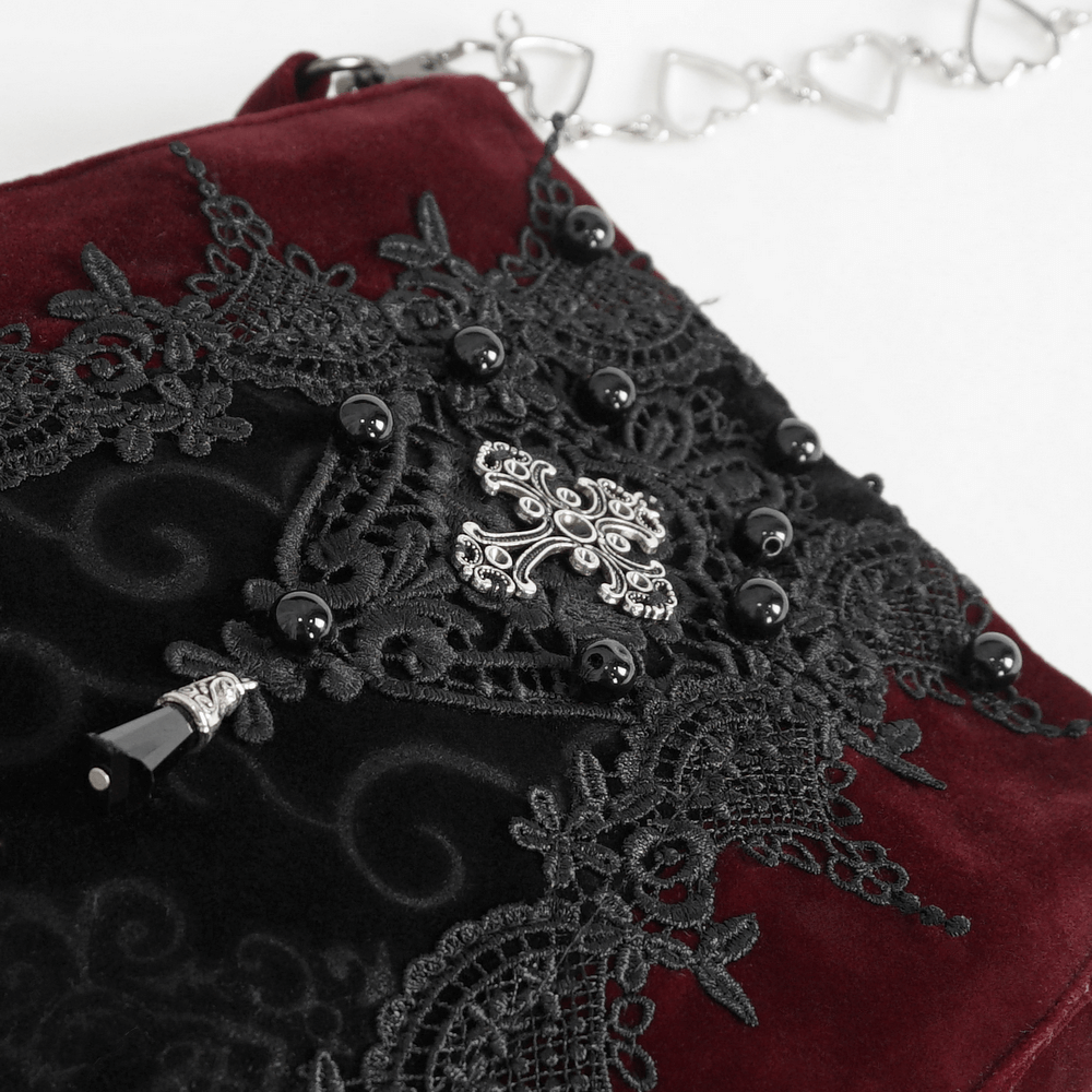 Luxurious women's gothic lace and velvet shoulder bag with intricate embroidery and detailed silver chain accents.