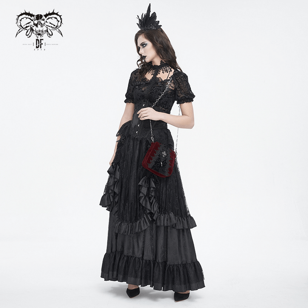 Elegant woman in Gothic lace dress holding a luxurious velvet shoulder bag with intricate designs.