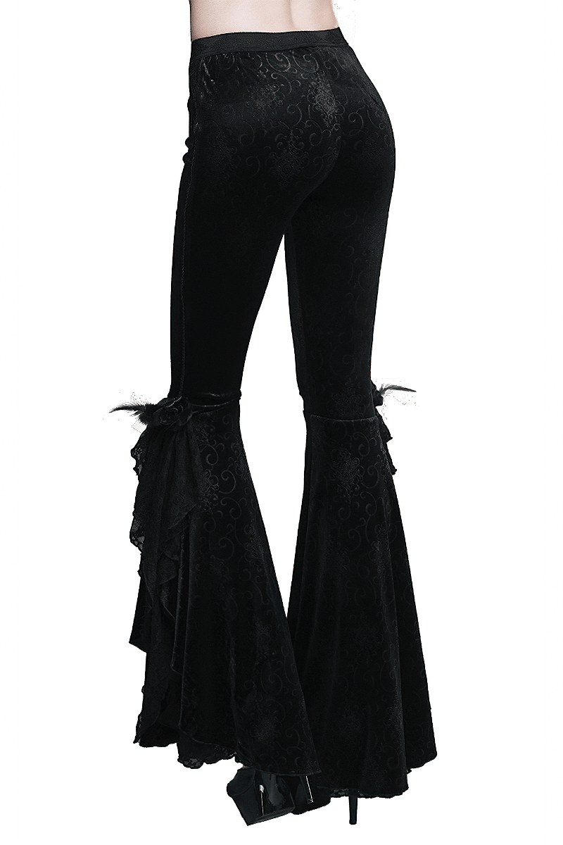 Stylish women's gothic black flared trousers with elegant ruffles and vintage design.