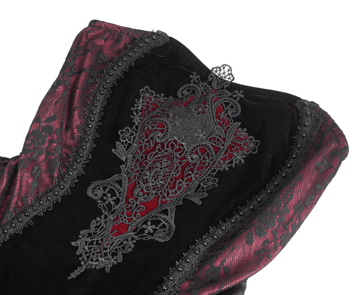 Close-up of intricate burgundy and black lace and velvet design on a gothic mermaid dress.
