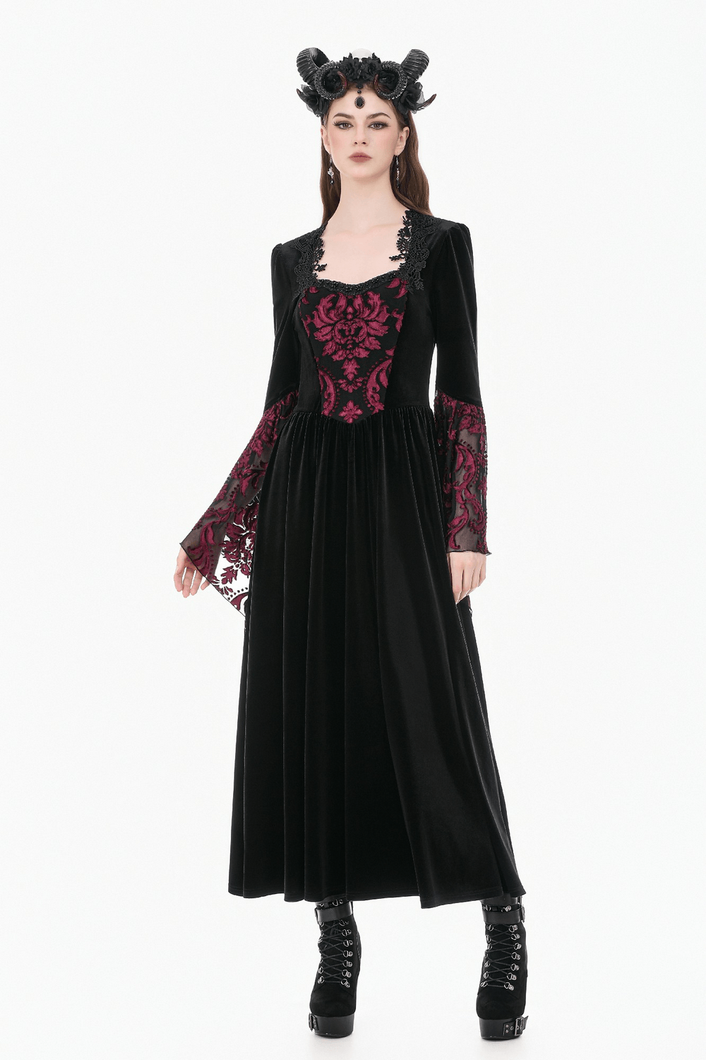 Women's Gothic Velvet Maxi Dress with Lace Bell Sleeves worn by a model in black and burgundy, showcasing dramatic details.