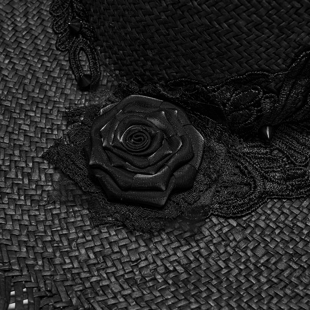 Women's Gothic Wide Brim Straw Hat with Frayed Fringe featuring a black rose and lace detail on a textured straw background.
