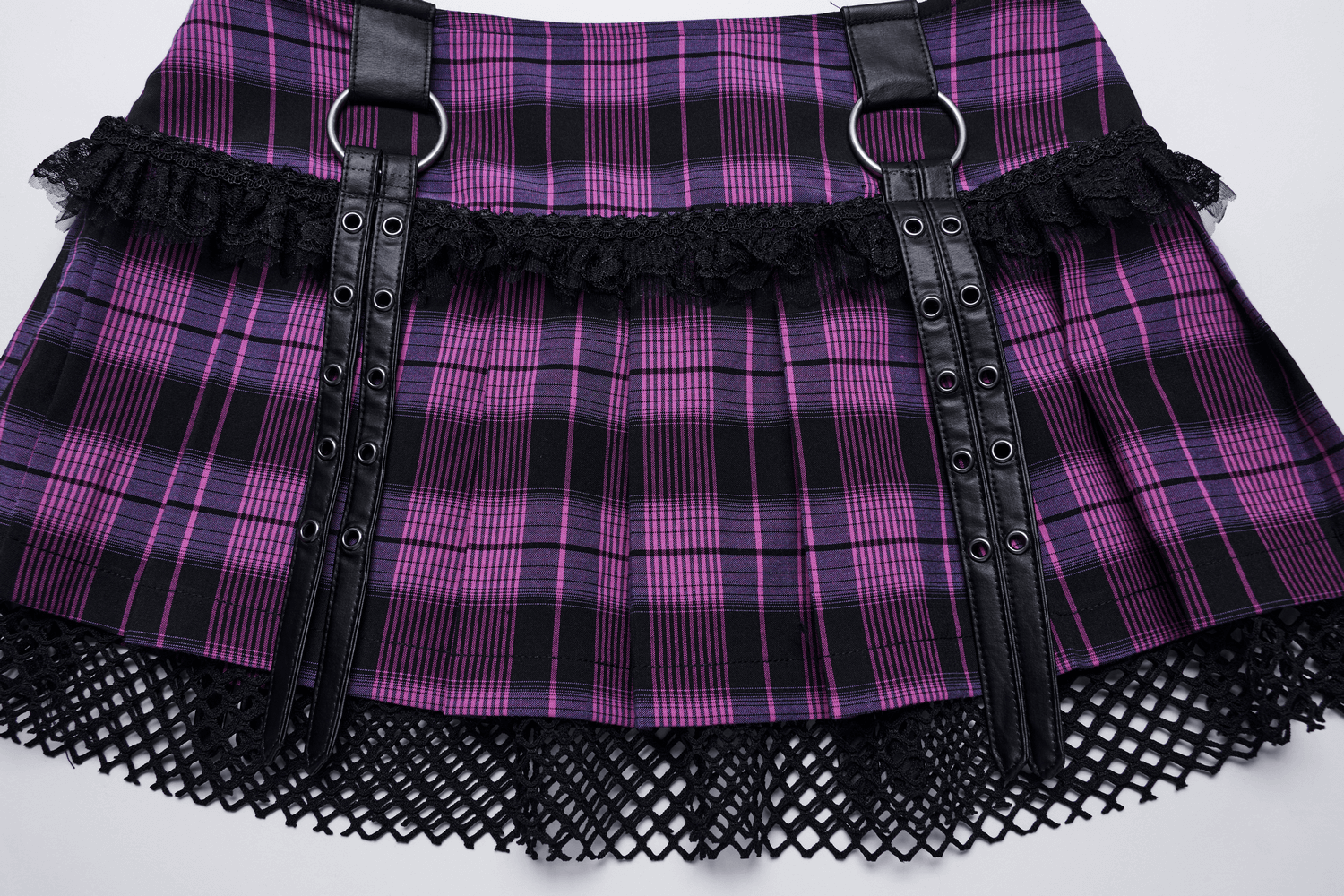 Women's purple plaid grunge mini skirt with lace trim and faux leather accents, perfect for edgy fashion lovers.