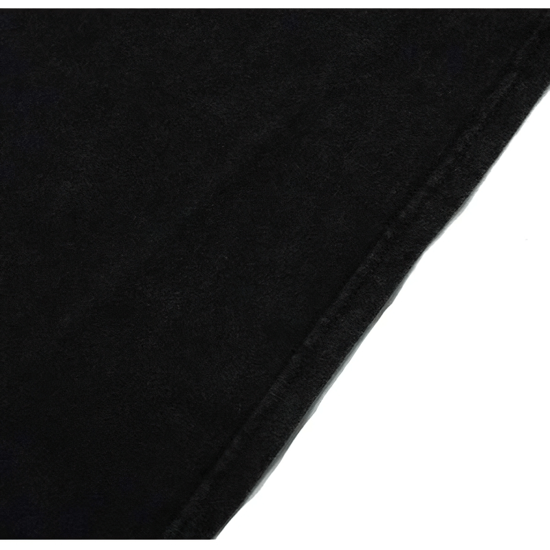 Close-up of a black fabric texture showcasing the softness and quality, perfect for punk style sweatshirts.