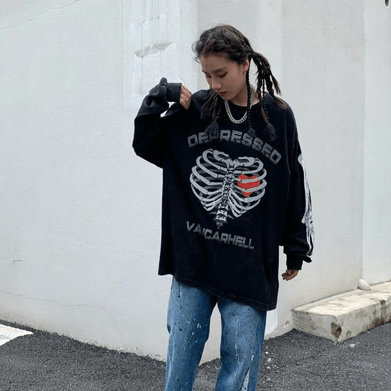 Women's oversized punk sweatshirt featuring eye-catching heart skeleton print and relaxed style.