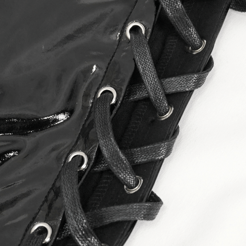 Close-up of lace-up detail on stylish women's patent leather skinny pants showcasing edgy elegance.