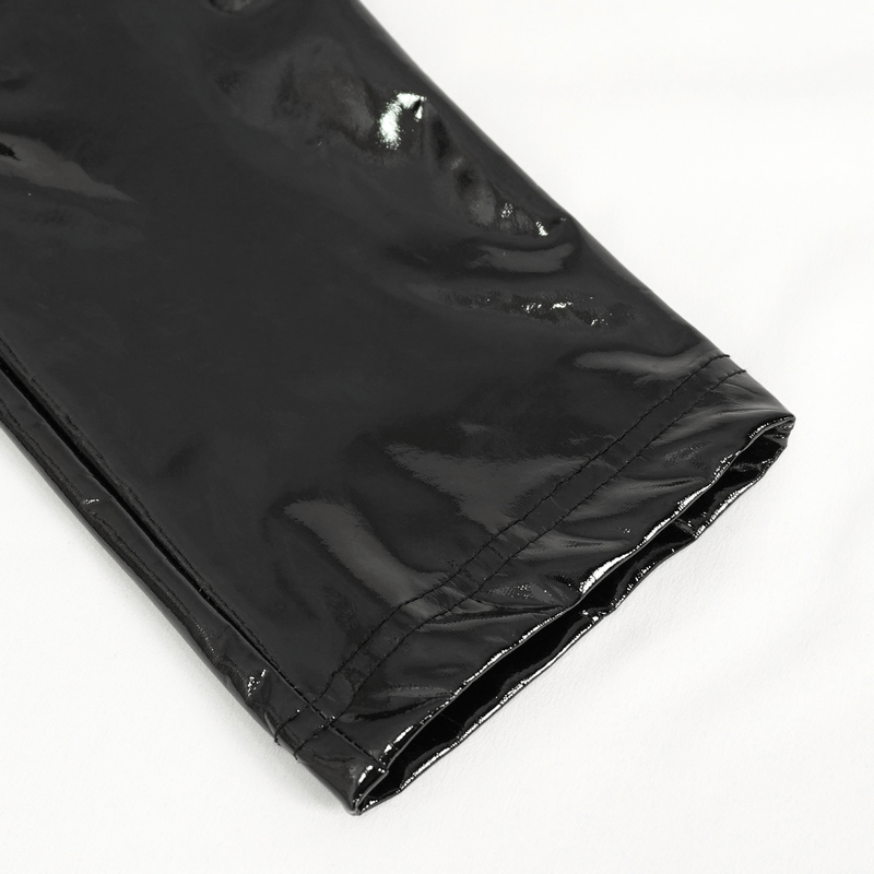 Close-up of women's hollow patent leather skinny pant leg, showcasing sleek glossy finish.