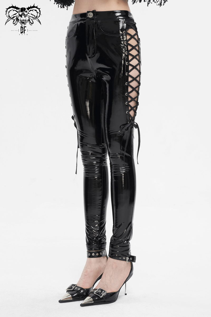 Women's hollow patent leather skinny pants with lace-up sides, delivering edgy elegance and bold fashion.