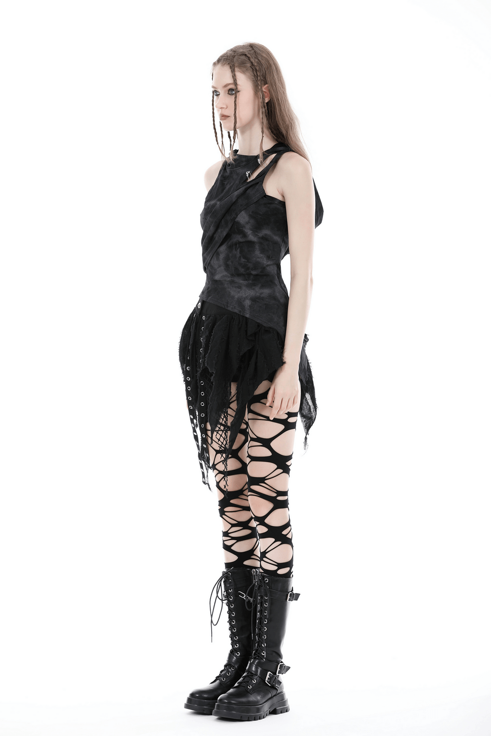 Model showcasing a Women's Hooded Sleeveless Punk Top with metal pins, styled with edgy laced leggings and combat boots.