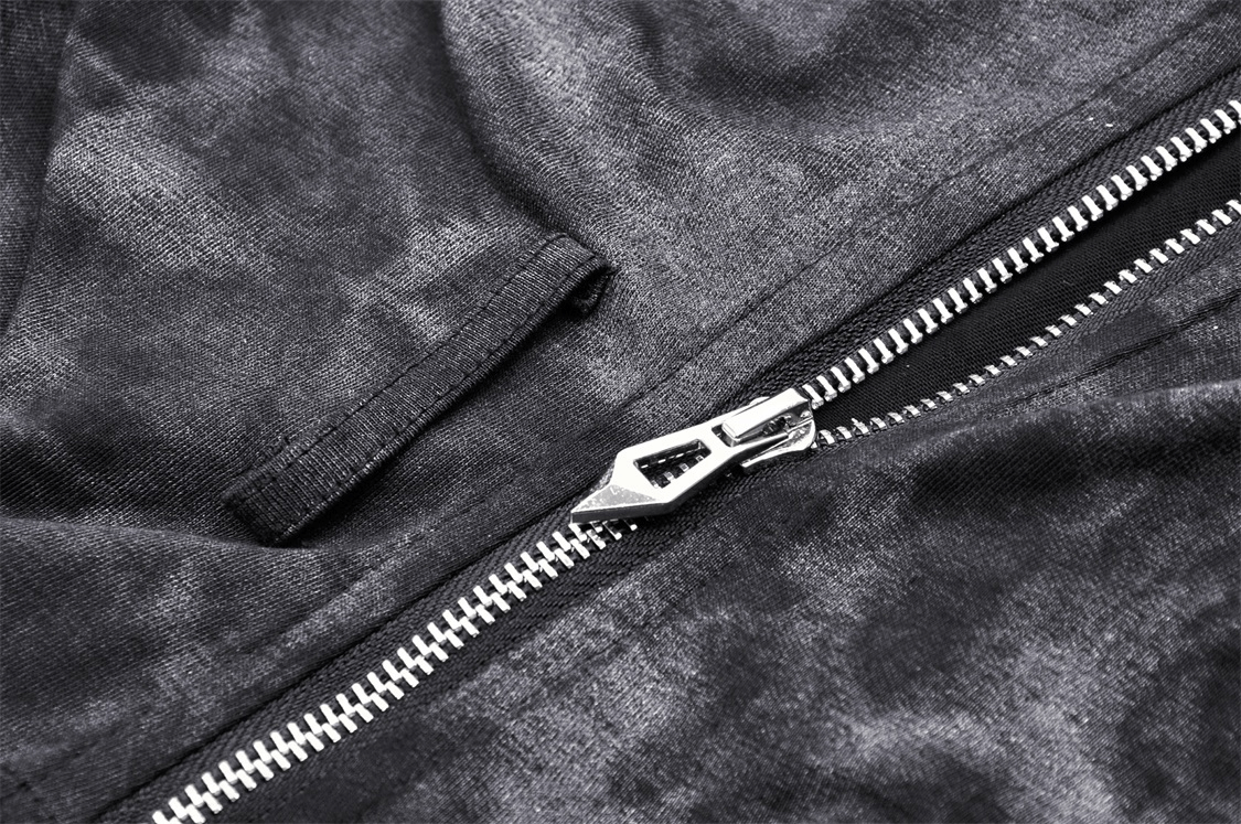 Close-up of sleek black fabric with a silver zipper, perfect for a punk hooded sleeveless top.