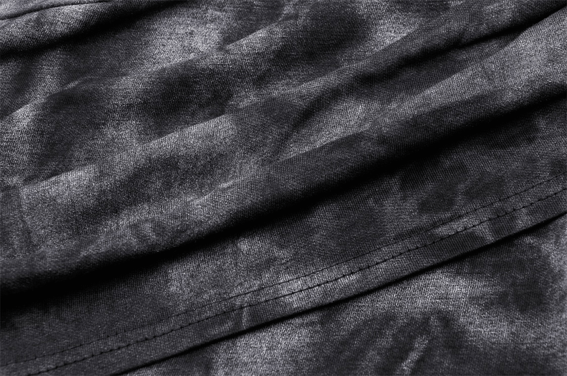Close-up of dark textured fabric with a subtle sheen, perfect for a gothic punk sleeveless top.