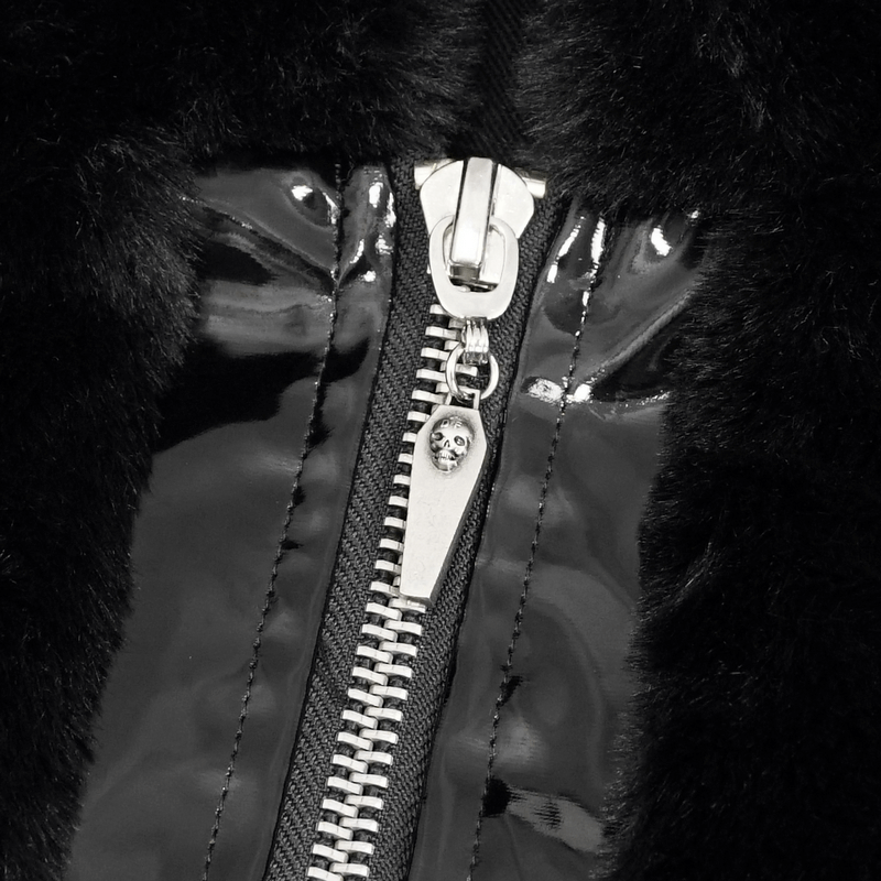 Close-up of black fur hooded jacket zipper with skull charm, perfect for gothic fashion enthusiasts.