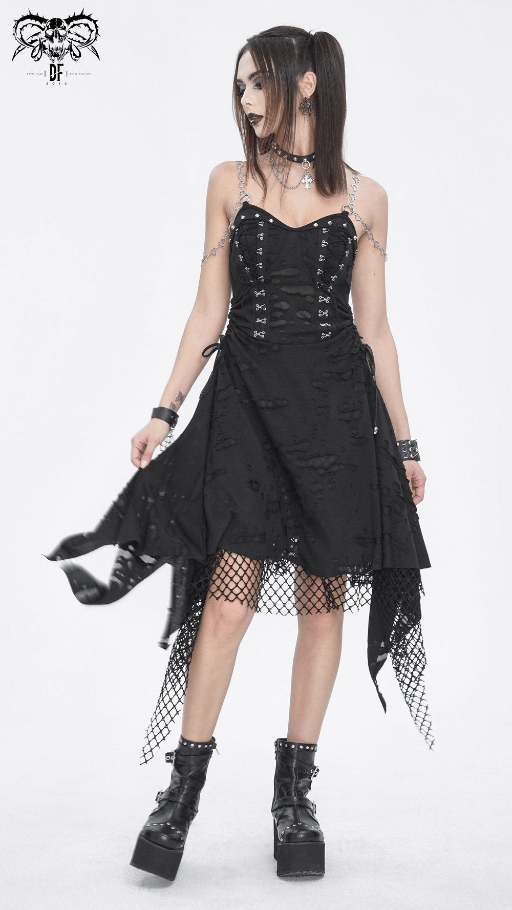 Dramatic women's black lace dress with asymmetrical hem and chain details, perfect for evening wear.