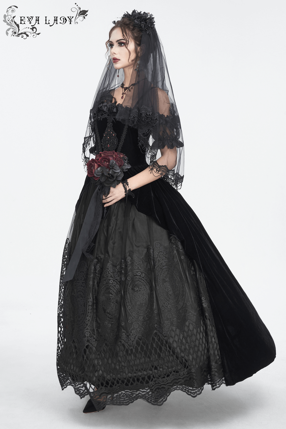 Elegant black lace evening dress with veil and bouquet, perfect for gothic-inspired formal occasions.
