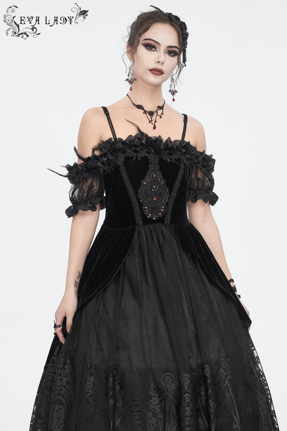 Elegant black lace dress with feathered short sleeves, perfect for formal occasions and evening events.
