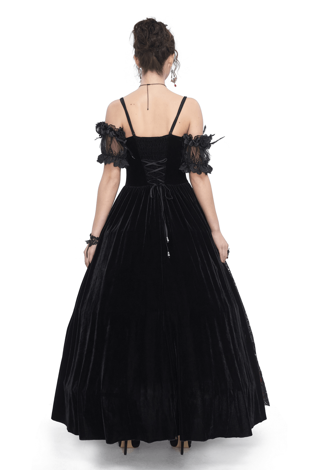 Back view of a stunning women's black lace evening dress with feathered short sleeves and a flowing skirt.
