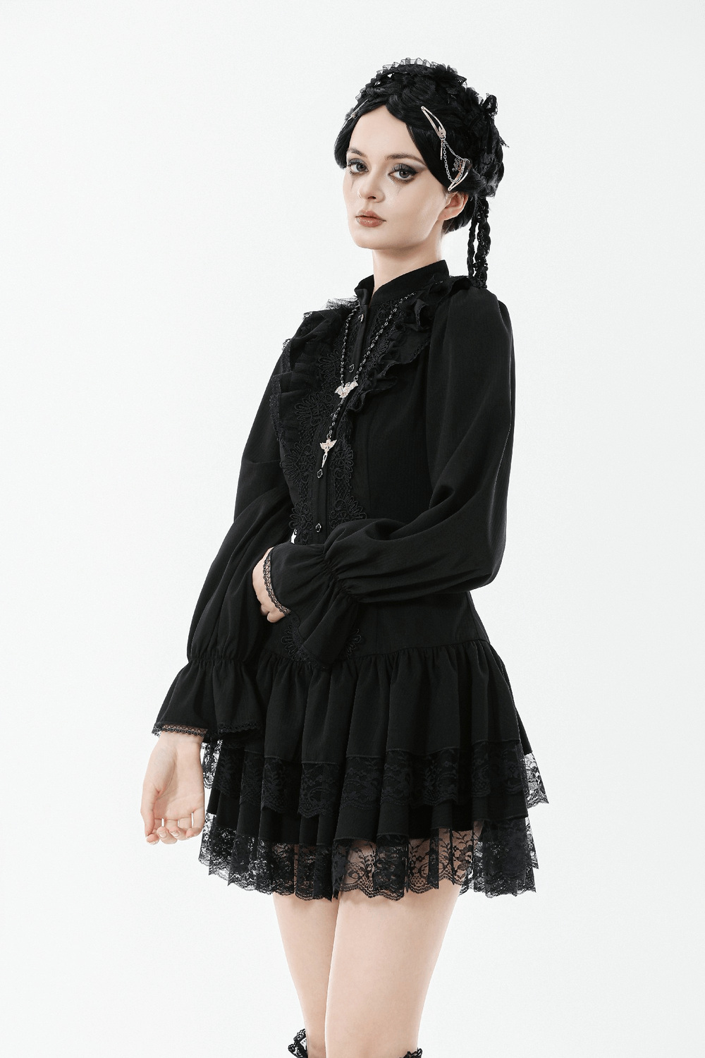 Women's Lace Mini Dress with Long Sleeves and Ruffles showcasing ruffles and lace trim on a model.