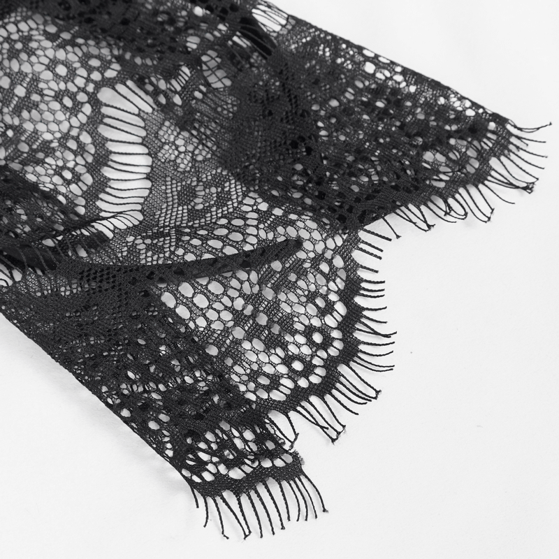 Close-up of black lace fabric with intricate patterns, perfect for gothic accessories like a rabbit ear's headdress.