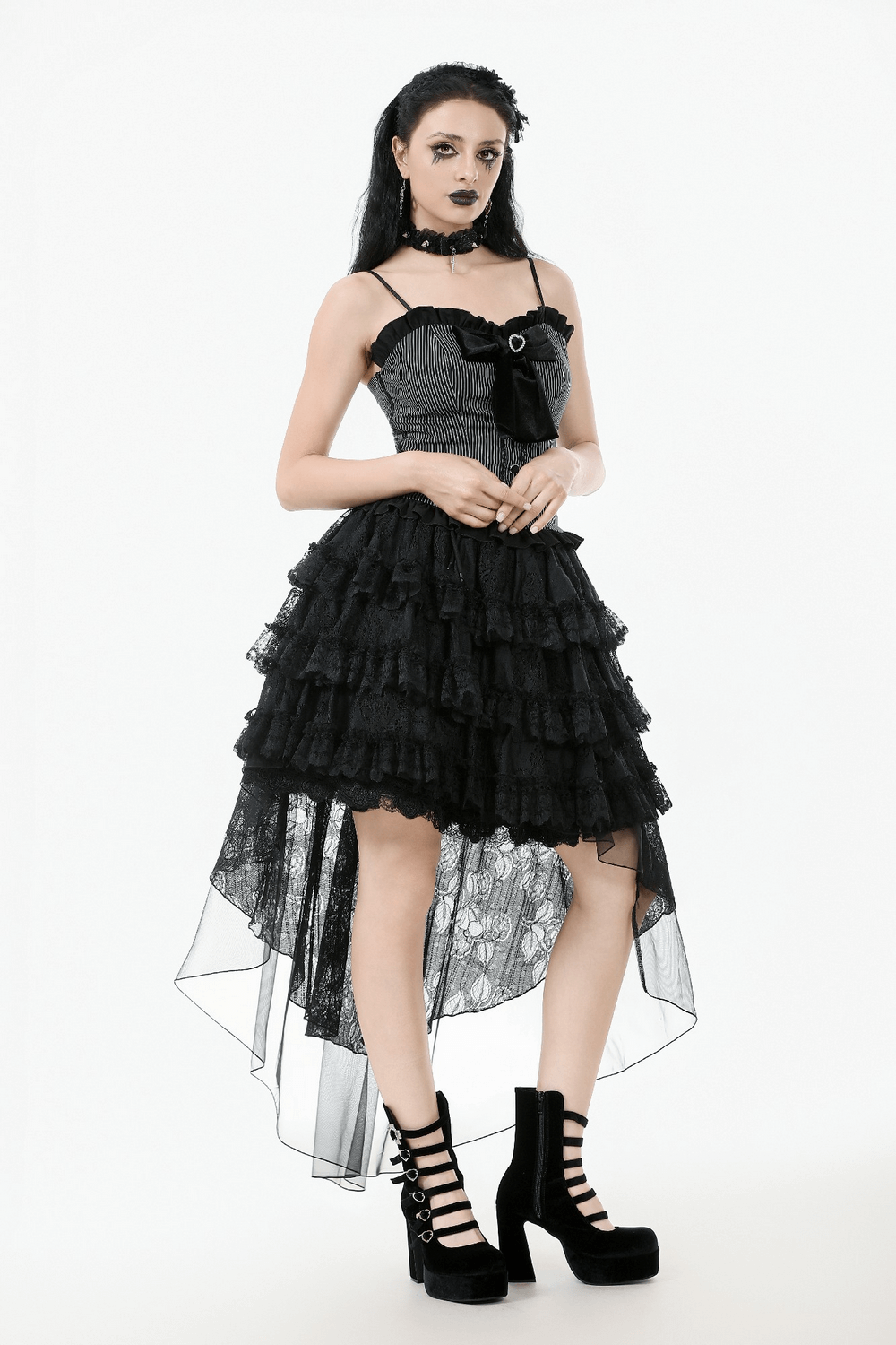 Gothic women's lace ruffled high-low skirt with sheer layers and edgy black heels, perfect for alternative outfits.