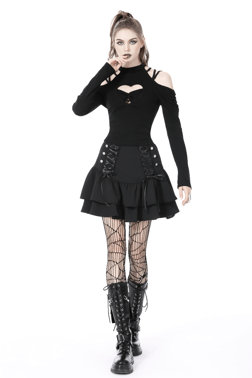 Gothic women's layered mini skirt with lace-up details and ruffled design, paired with stylish fishnet tights and boots.