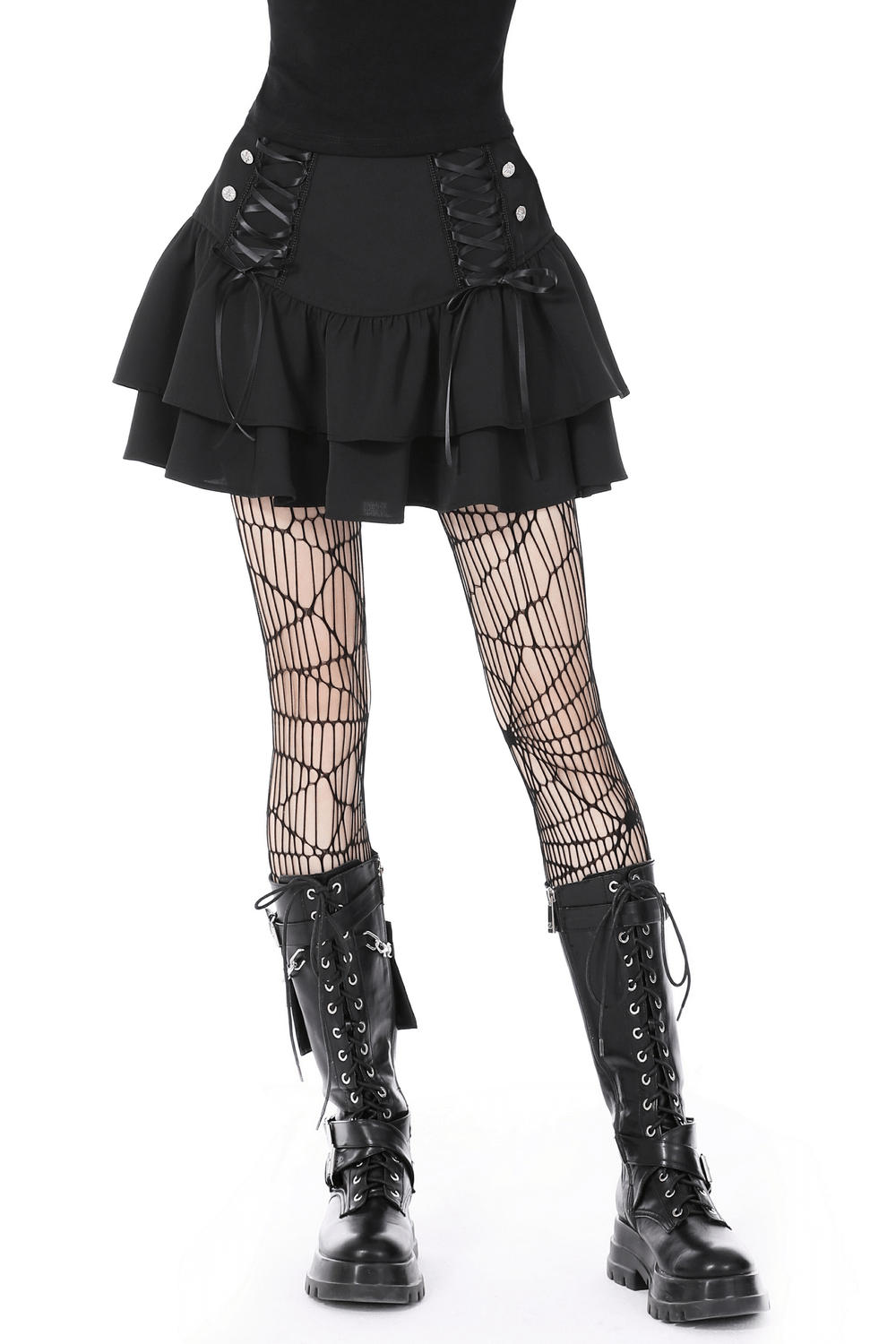 Dark goth layered mini skirt with lace-up details and flared ruffles, paired with fishnet tights and combat boots.