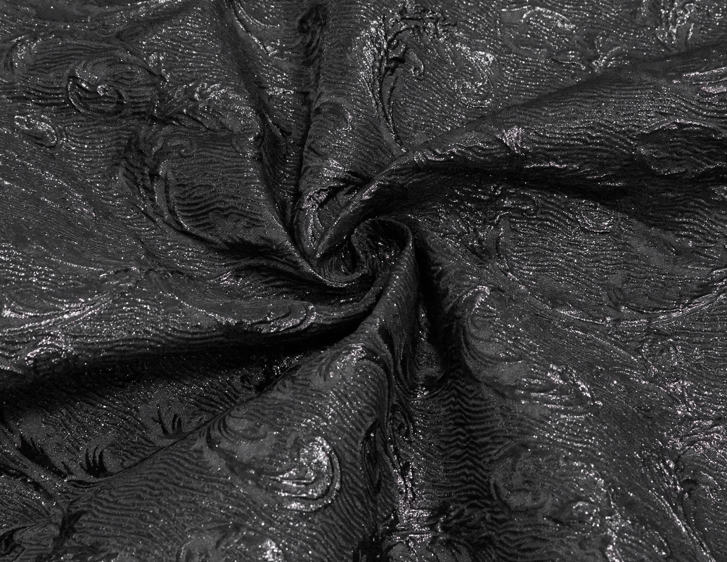 Luxurious black velvet fabric with intricate floral patterns, perfect for gothic style dresses.