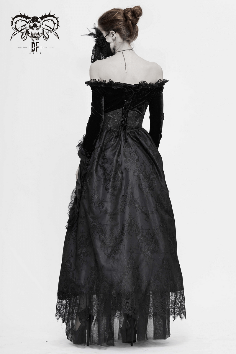 Elegant women's long black gothic dress with flare sleeves and vintage lace details, showcasing a luxurious velvet finish.