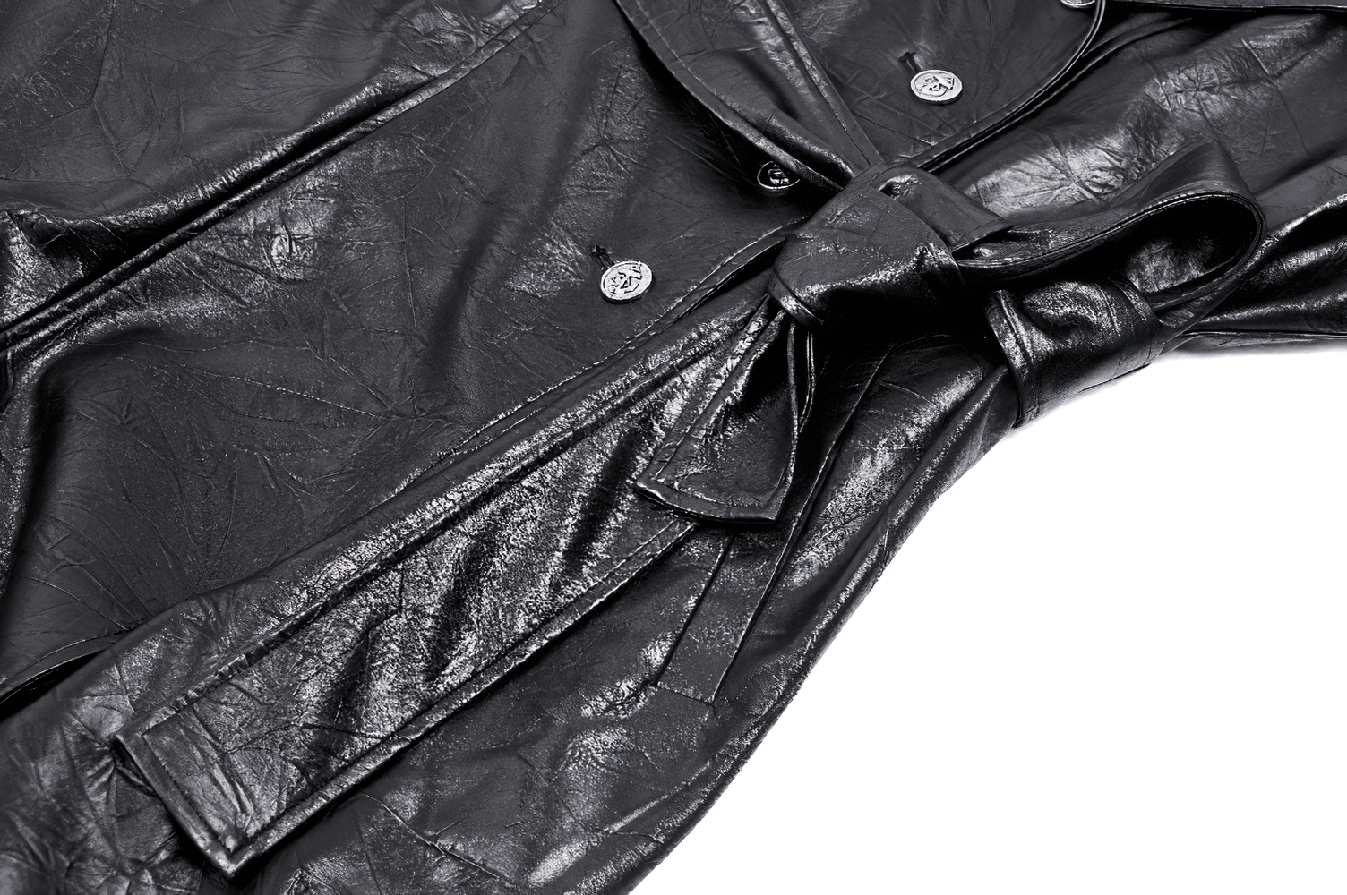 Close-up of women's black faux leather trench coat with a belted waist and button details.