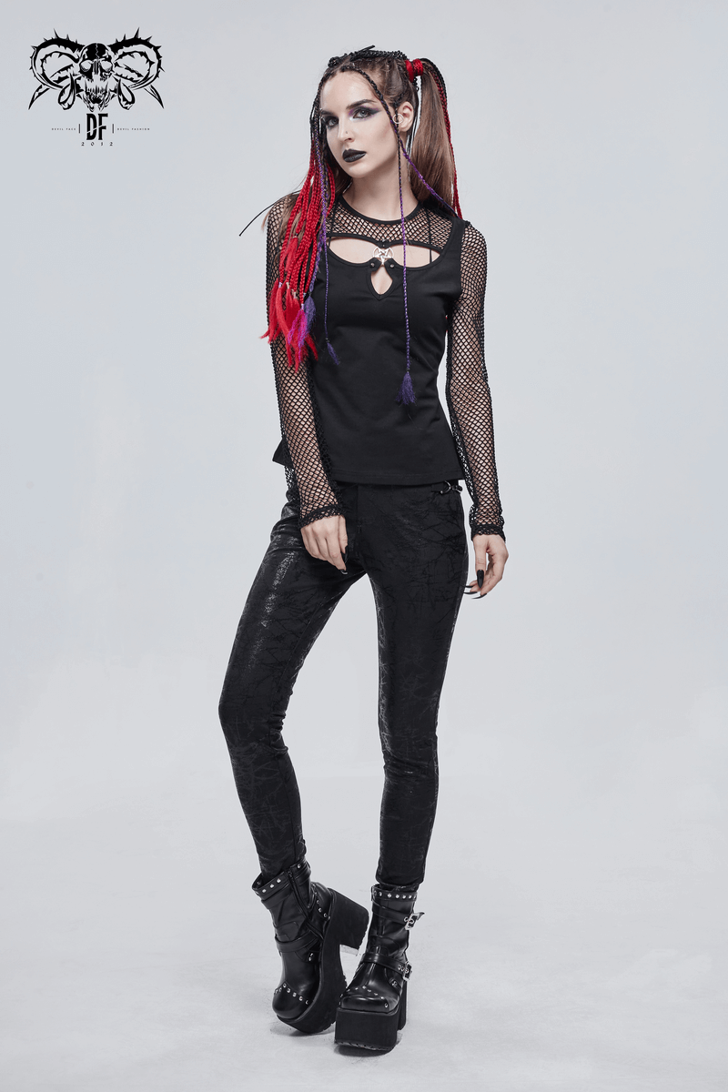 Model showcasing a women's gothic black mesh top with pentagram detail and stylish leggings.
