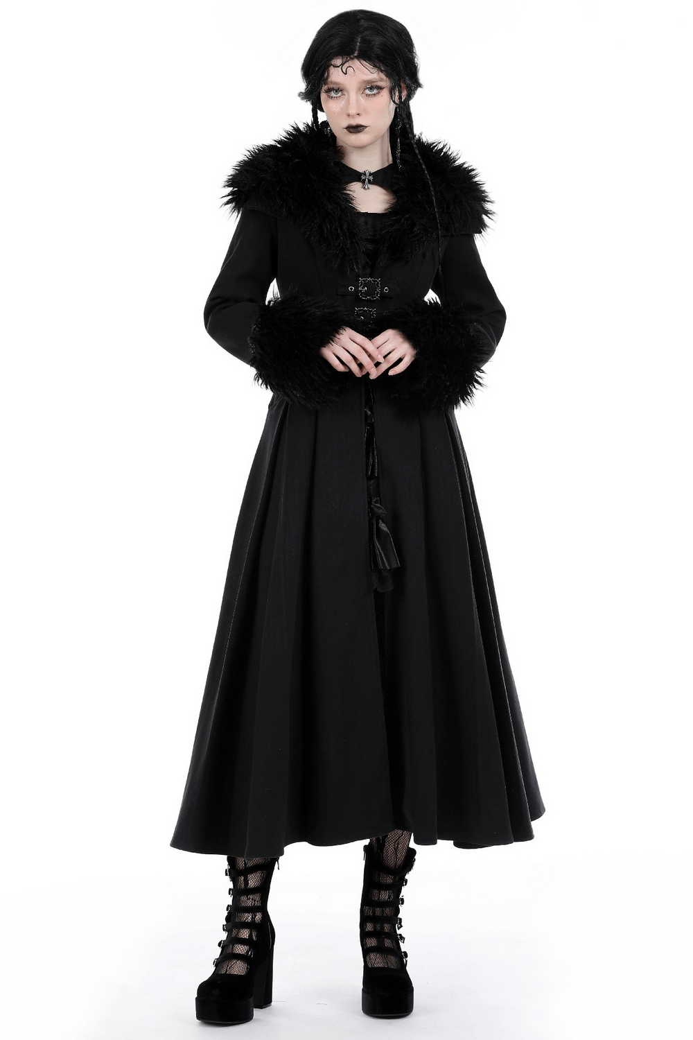 Stylish women's long black trench coat with faux fur collar and cuffs, perfect for a dramatic winter look.
