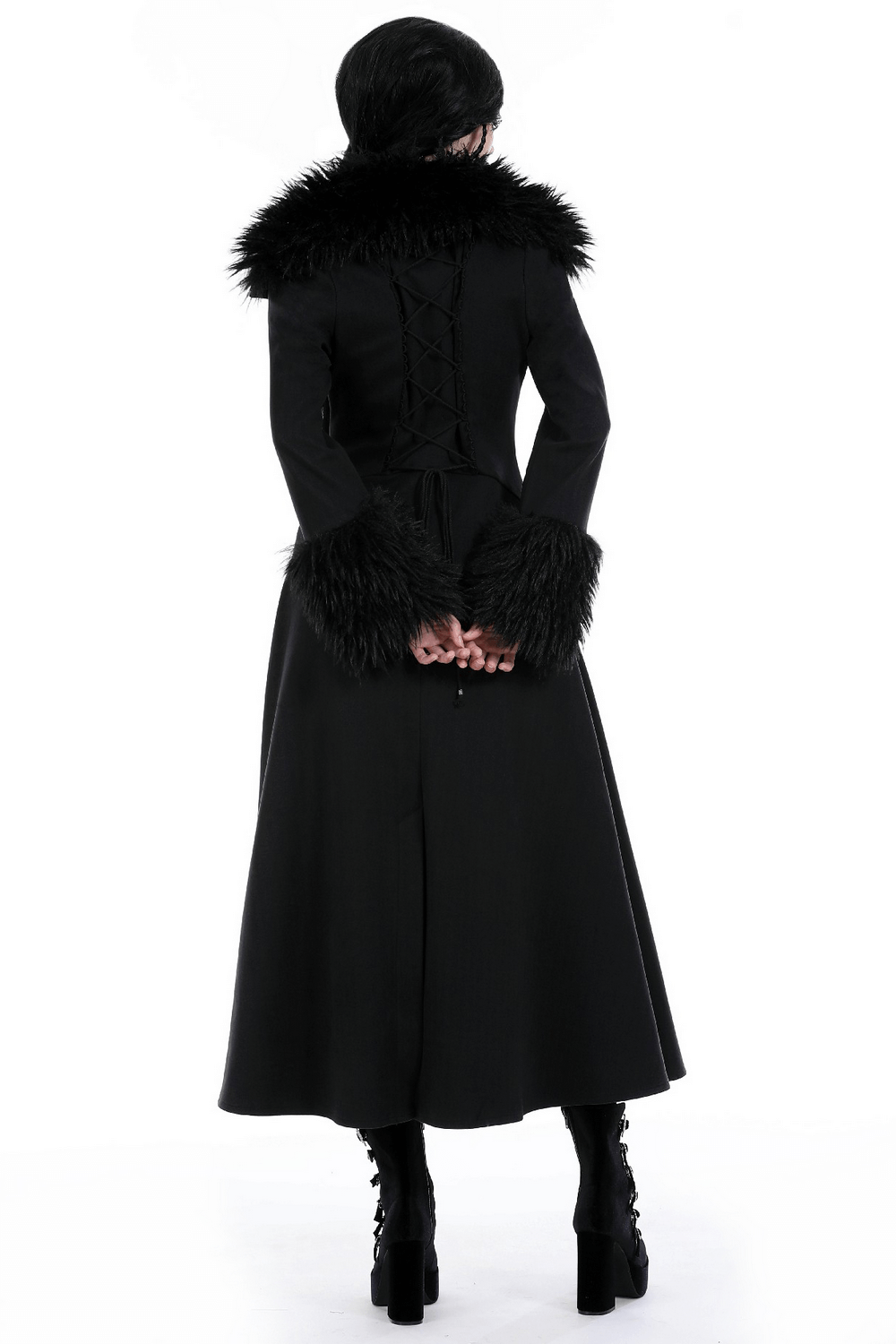 Back view of a stylish women's long black trench coat with faux fur collar and cuffs, perfect for winter fashion.