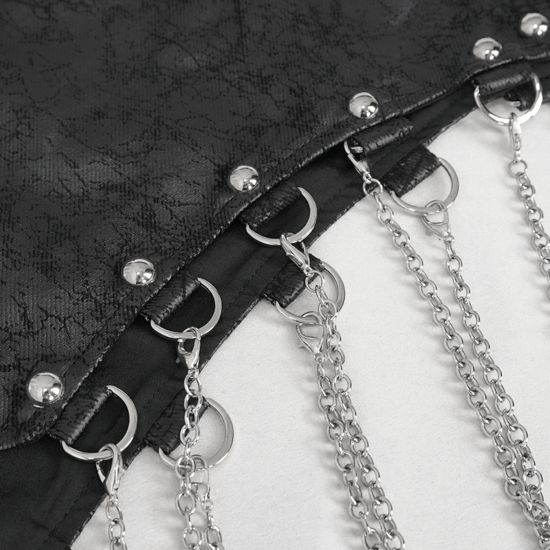 Close-up of black mesh skirt detailing with silver chains and buckles, showcasing punk style elegance.