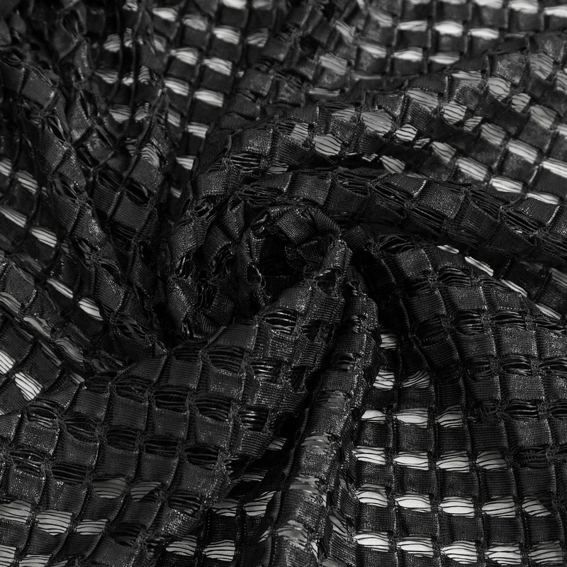 Close-up of textured black mesh fabric, showcasing stylish weave for unique women's clothing designs.