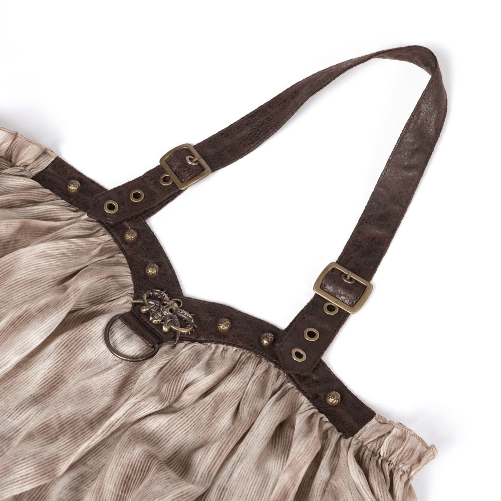 Women's off-shoulder coffee top detail featuring halter strap, buckle accents, and central metal ring for bold style.