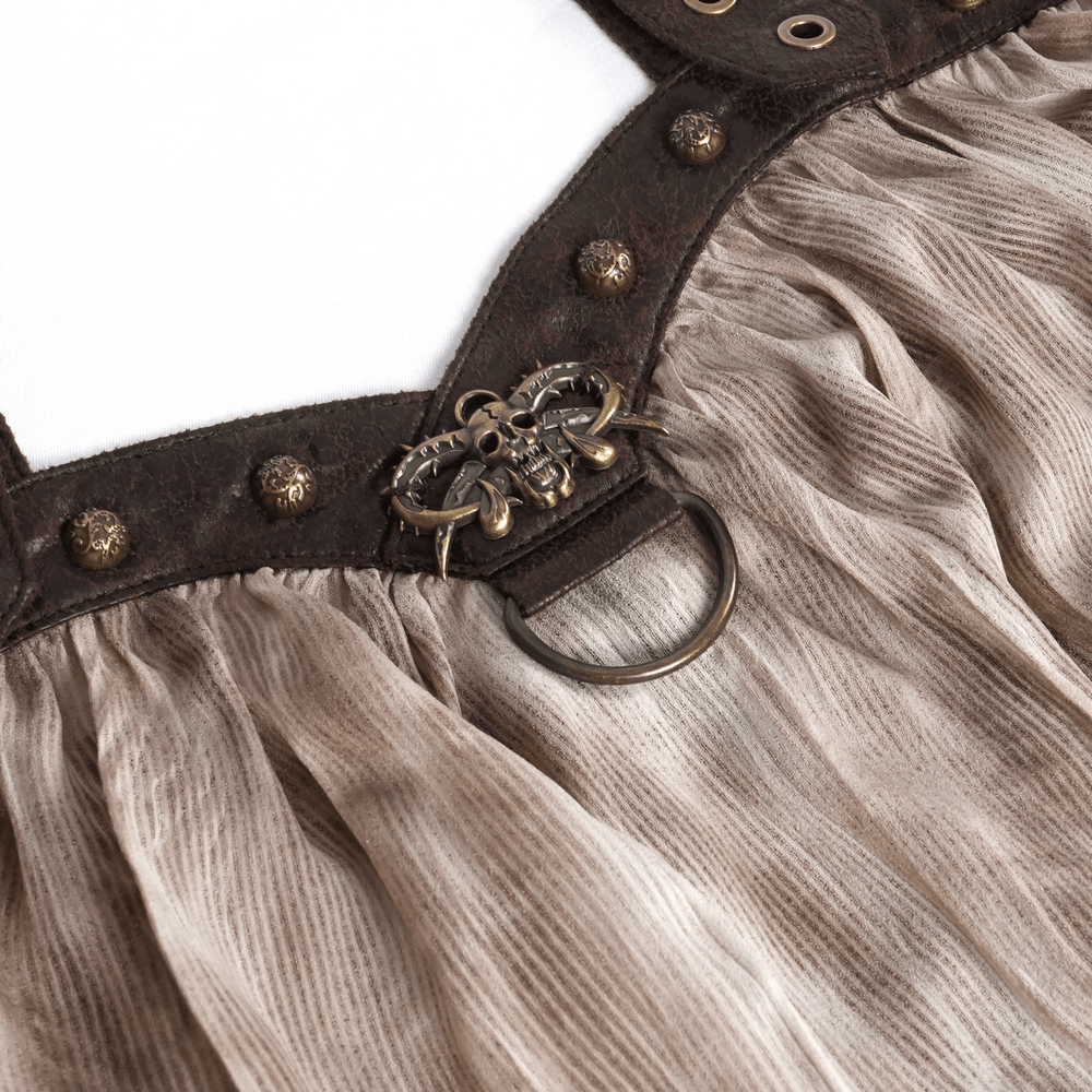 Close-up of women's off-shoulder coffee top with buckle harness, featuring intricate buckle details and textured fabric.