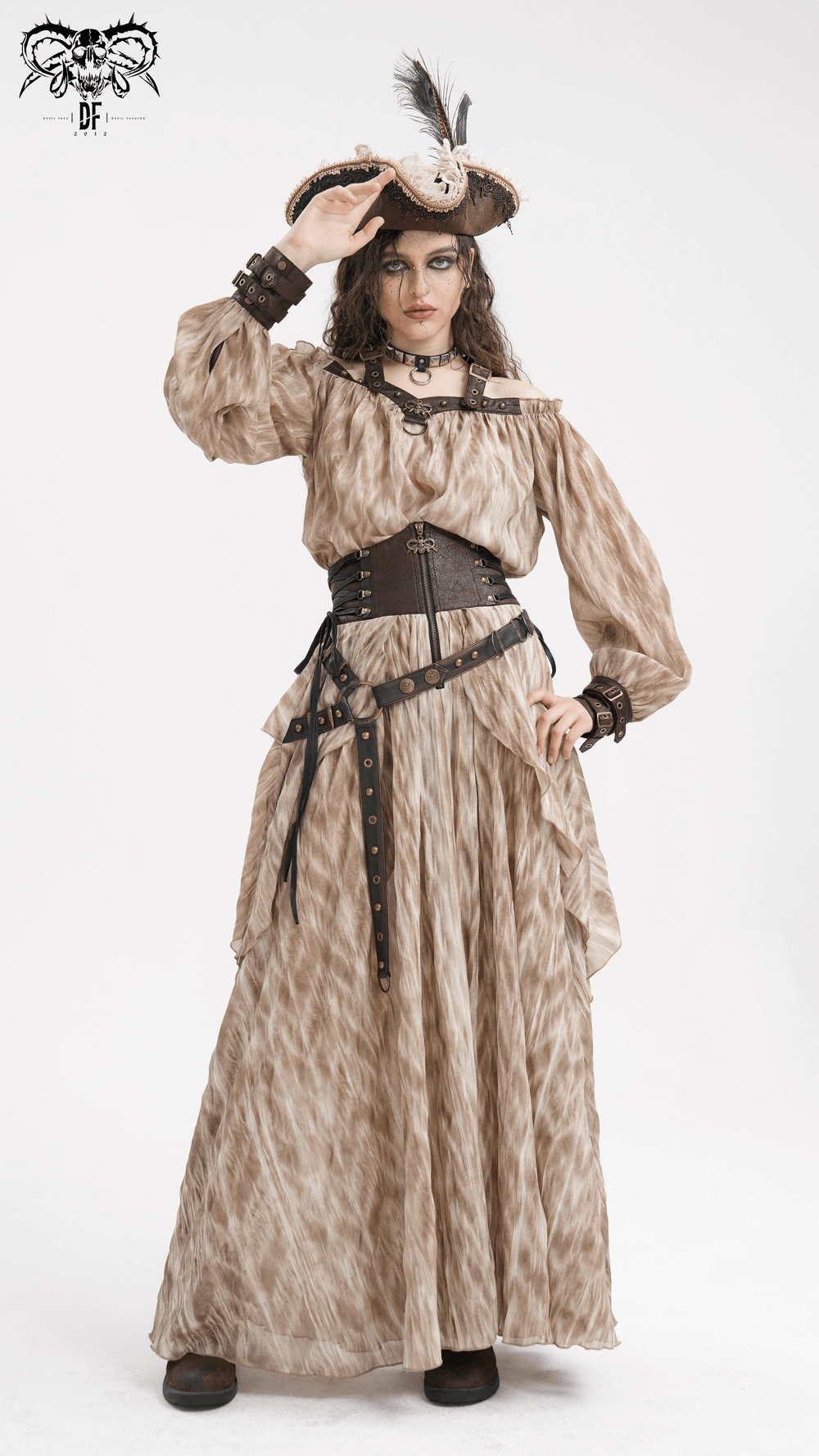 Woman in a textured brown long dress with a corset belt, pirate hat, and striking accessories for a bold, adventurous look.