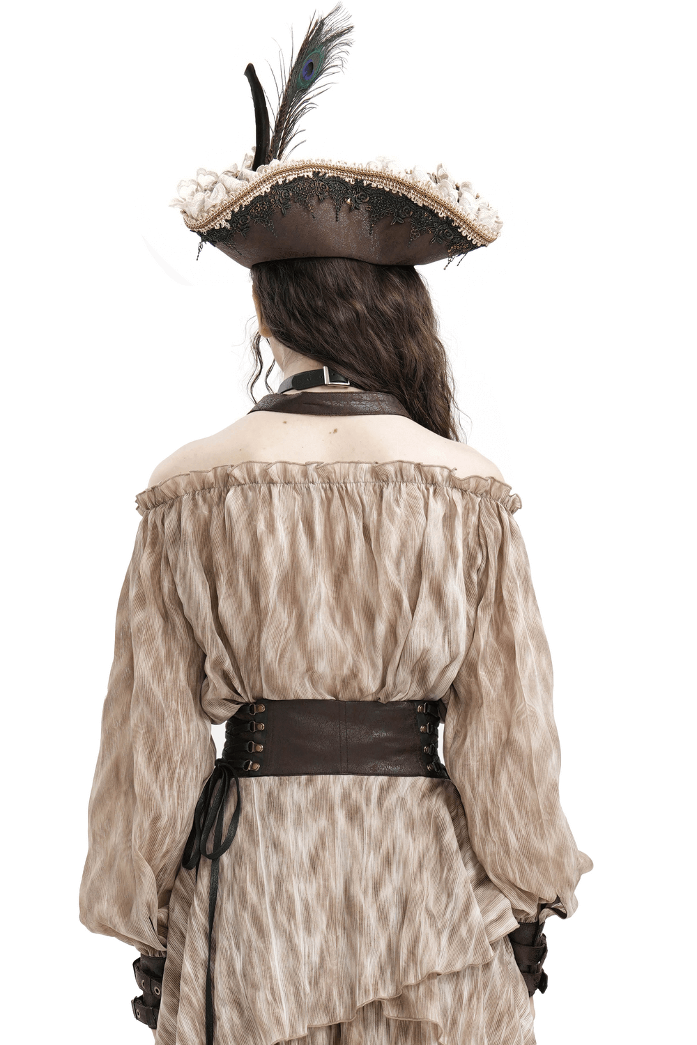 Back view of a woman in a stylish off-shoulder top and pirate hat with a feather, showcasing an adventurous look.