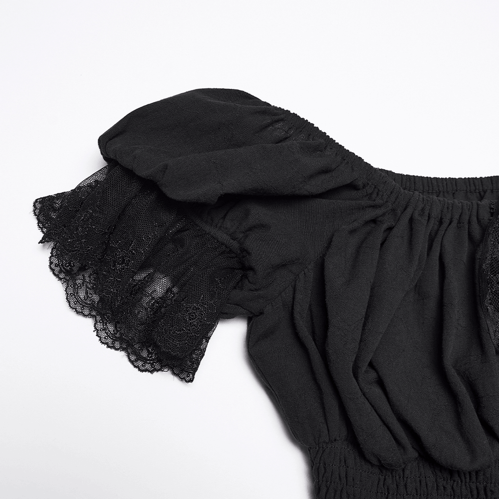 Alt Tag: Women's Off Shoulder High Low Gothic Maxi Dress close-up of black off-shoulder sleeve with lace trim and smocked waist