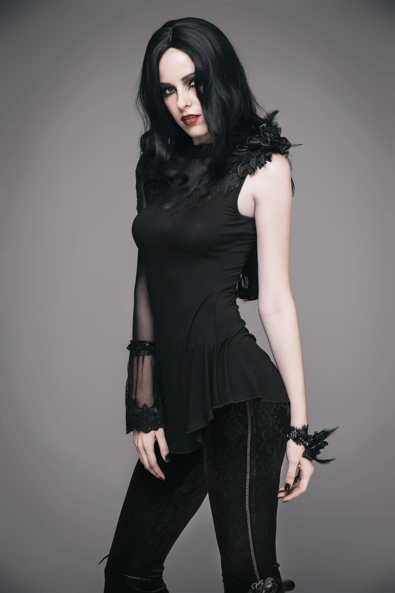 Stylish woman in black asymmetric gothic top with floral details, showcasing trendy and romantic gothic fashion.