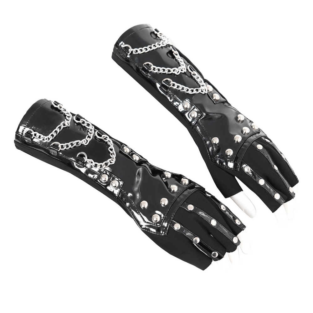 Women's black patent leather gloves with chains and studs for an edgy fashion statement.