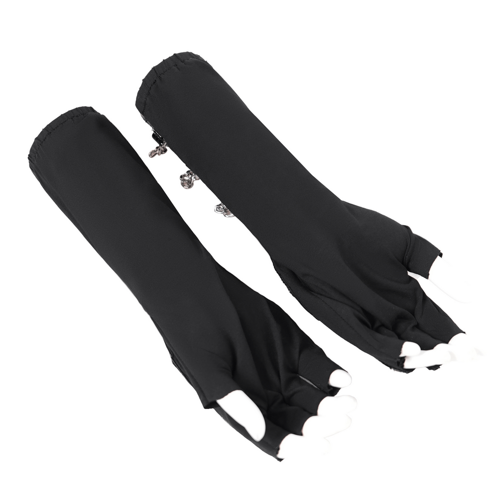 Edgy women's black patent leather gloves with chains and studs for a bold fashion statement.