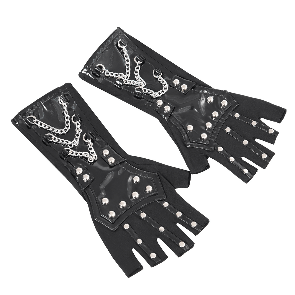 Stylish women's black patent leather gloves with chains and studs for an edgy fashion statement.