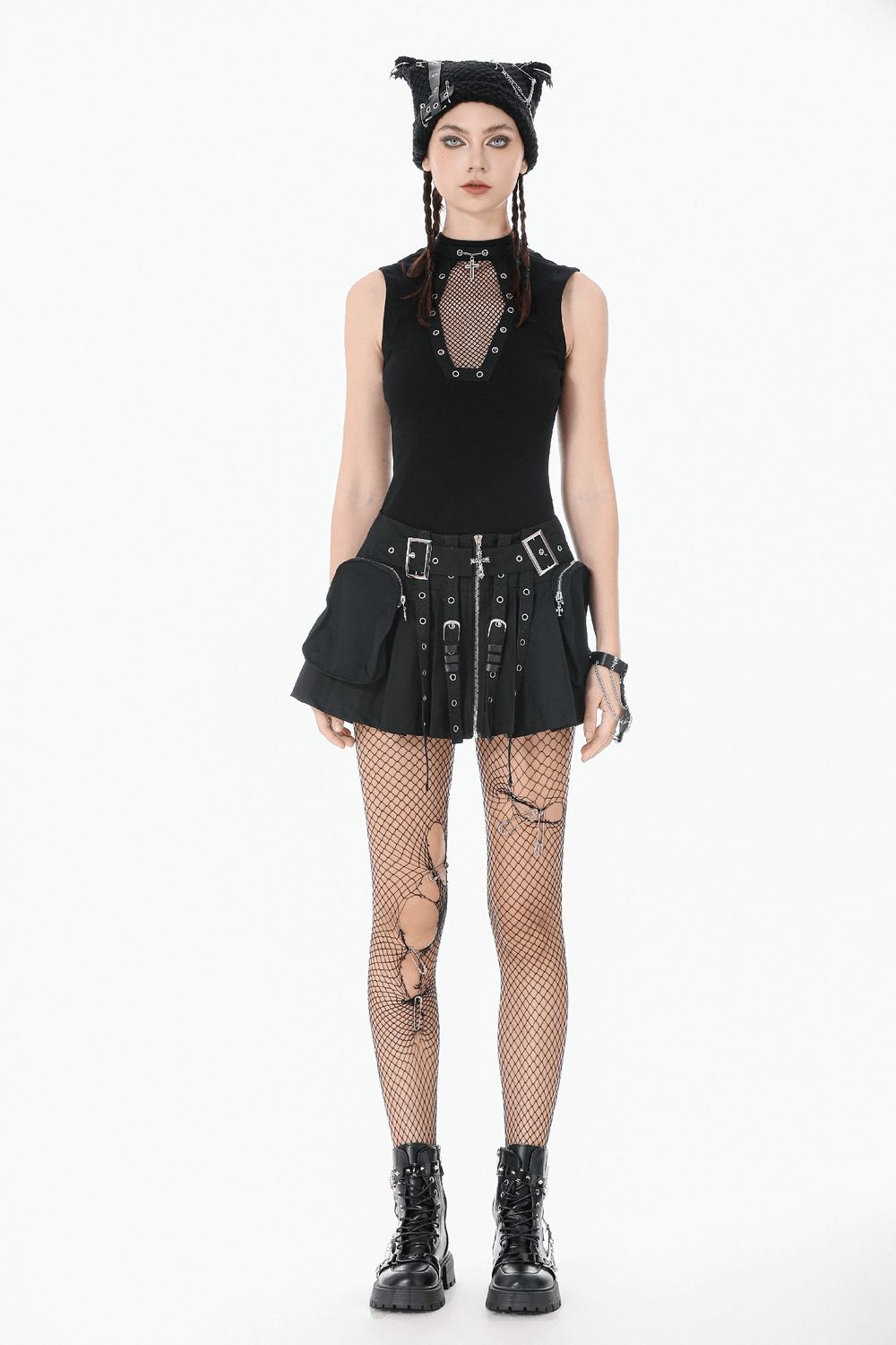 Women's Pleated Skirt with Zip Details and Studded Straps worn with fishnet tights and accessories.