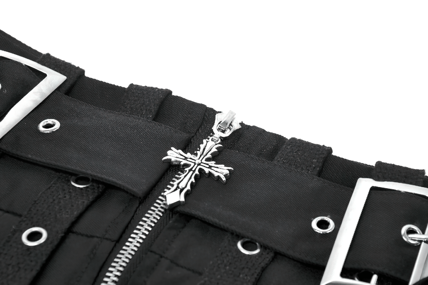 Close-up of Women's Pleated Skirt with Zip Details and Studded Straps showcasing zipper and cross design.